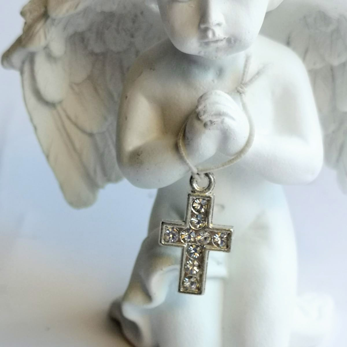 Detailed small pottery cherub child angel with diamonte cross