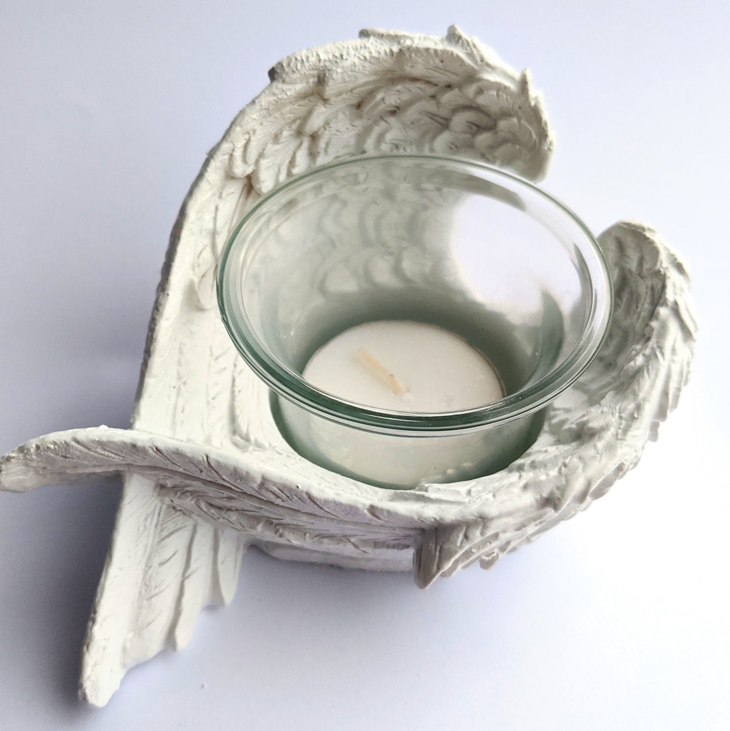 Elegant angel wing candle holder