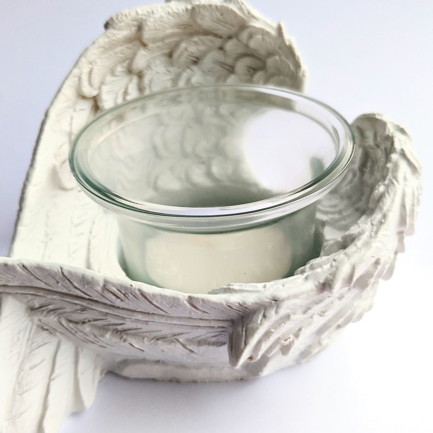 Elegant angel wing candle holder