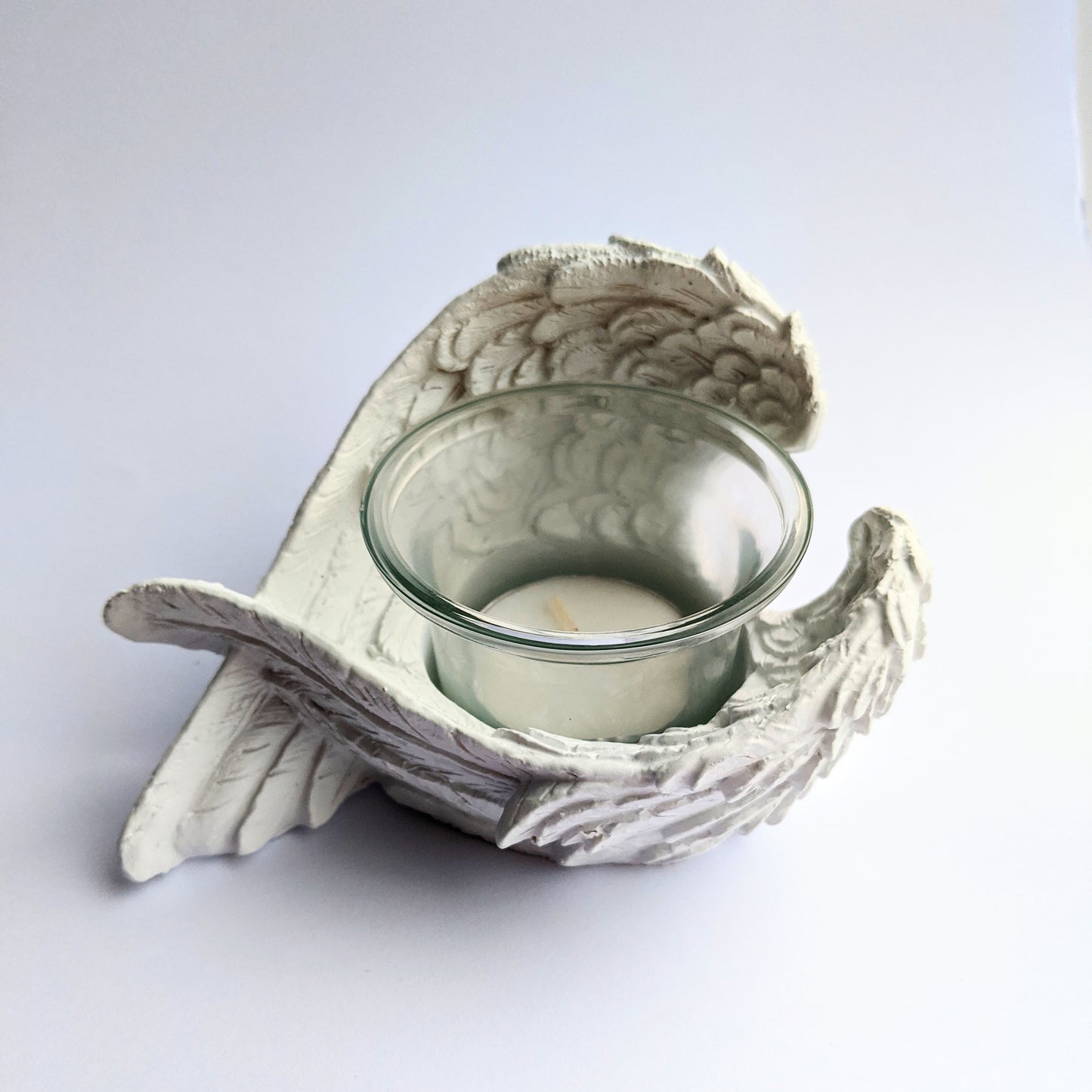 Elegant angel wing candle holder