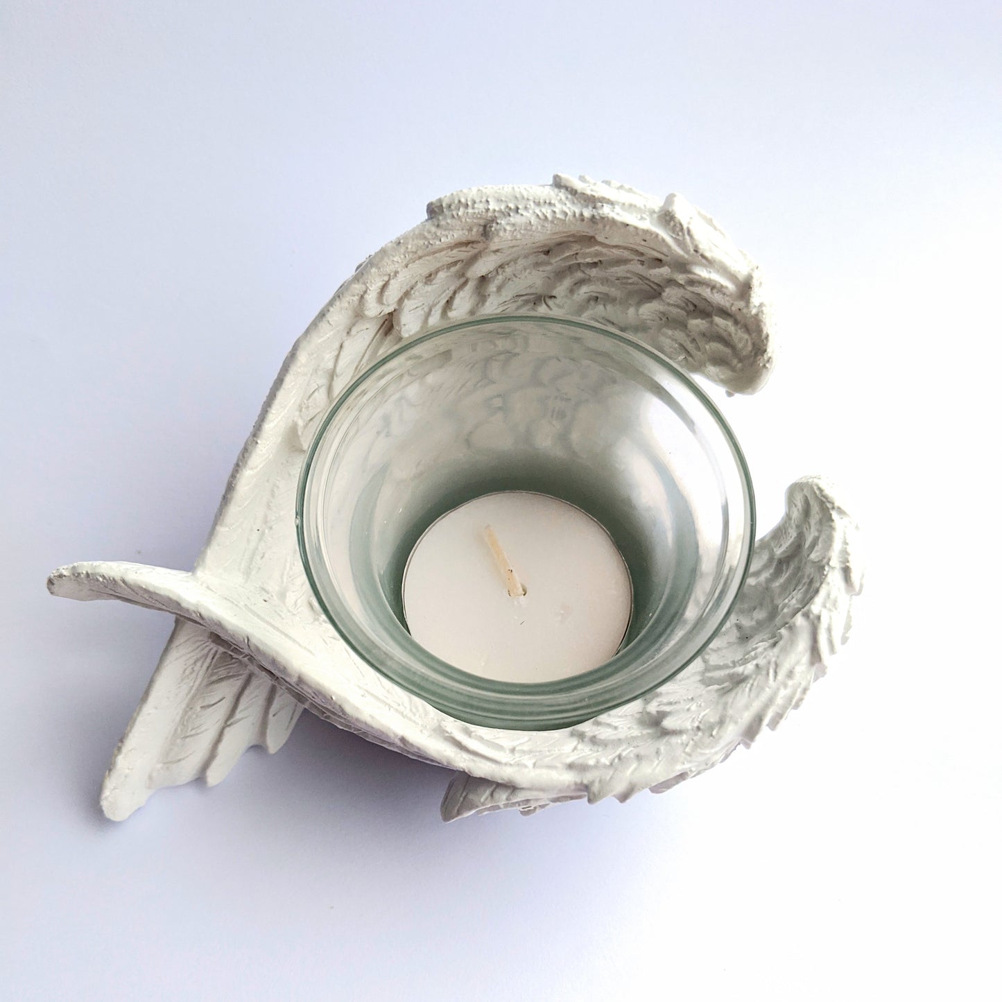 Elegant angel wing candle holder